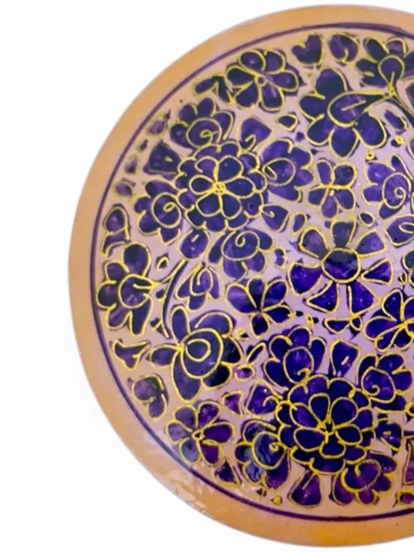 Noori Couture handpainted papier-mâché round coaster with intricate floral pattern in purple and gold.