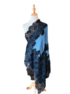 Noori Couture blue and black Kashmiri wool shawl featuring delicate black Valentino lace trim on a mannequin