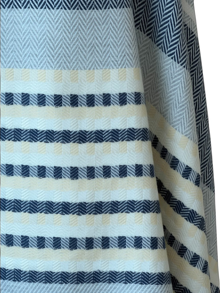 Noori Couture cashmere scarf with grey, white, and pale yellow stripes in herringbone and check patterns.