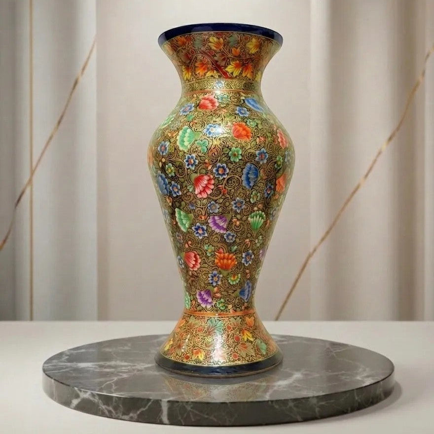 Noori Couture hand-painted floral decorative vase made with Papier Mache with vibrant colorful motifs and gold patterns. Curved silhouette.