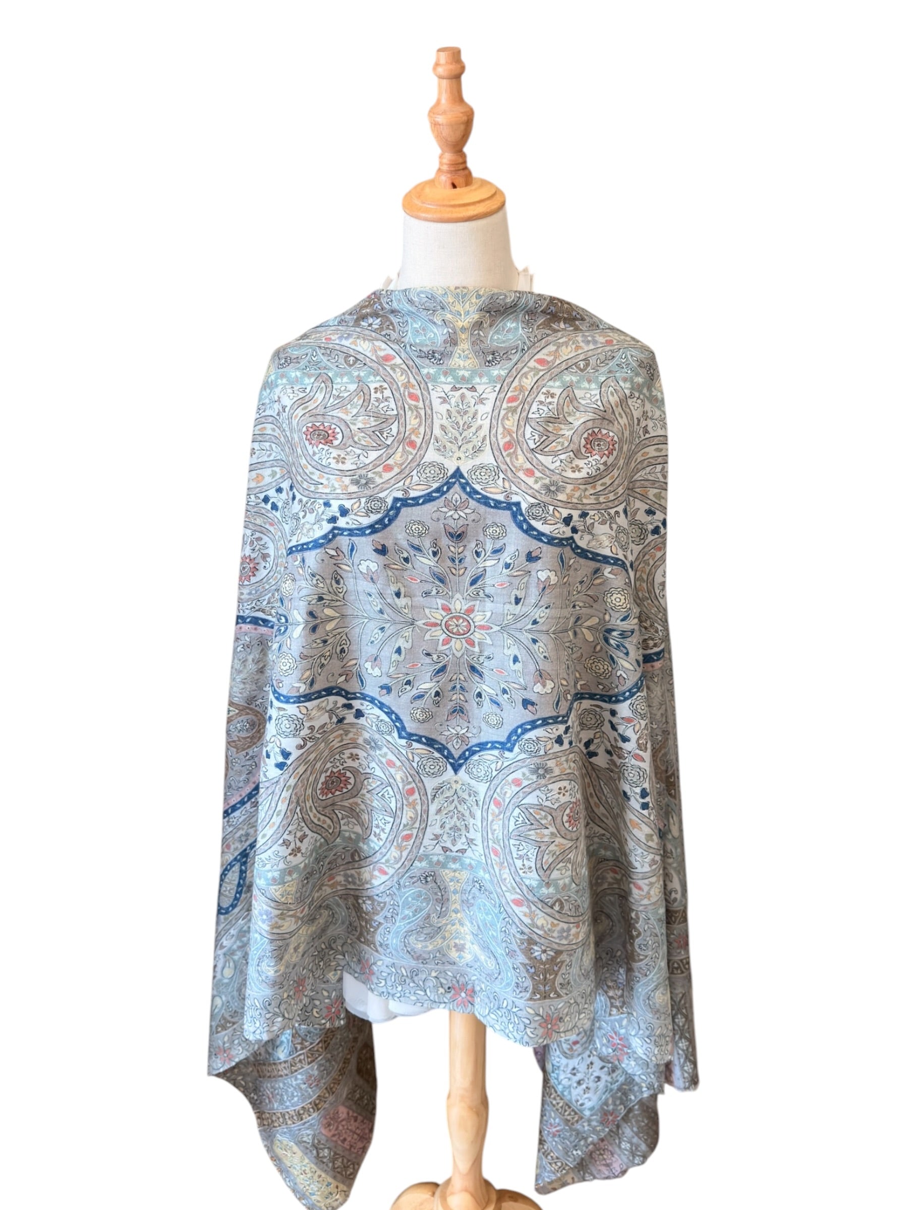 Noori Couture handwoven aqua Merino wool shawl featuring intricate hand-painted Kalamkari motifs and silk embroidery.