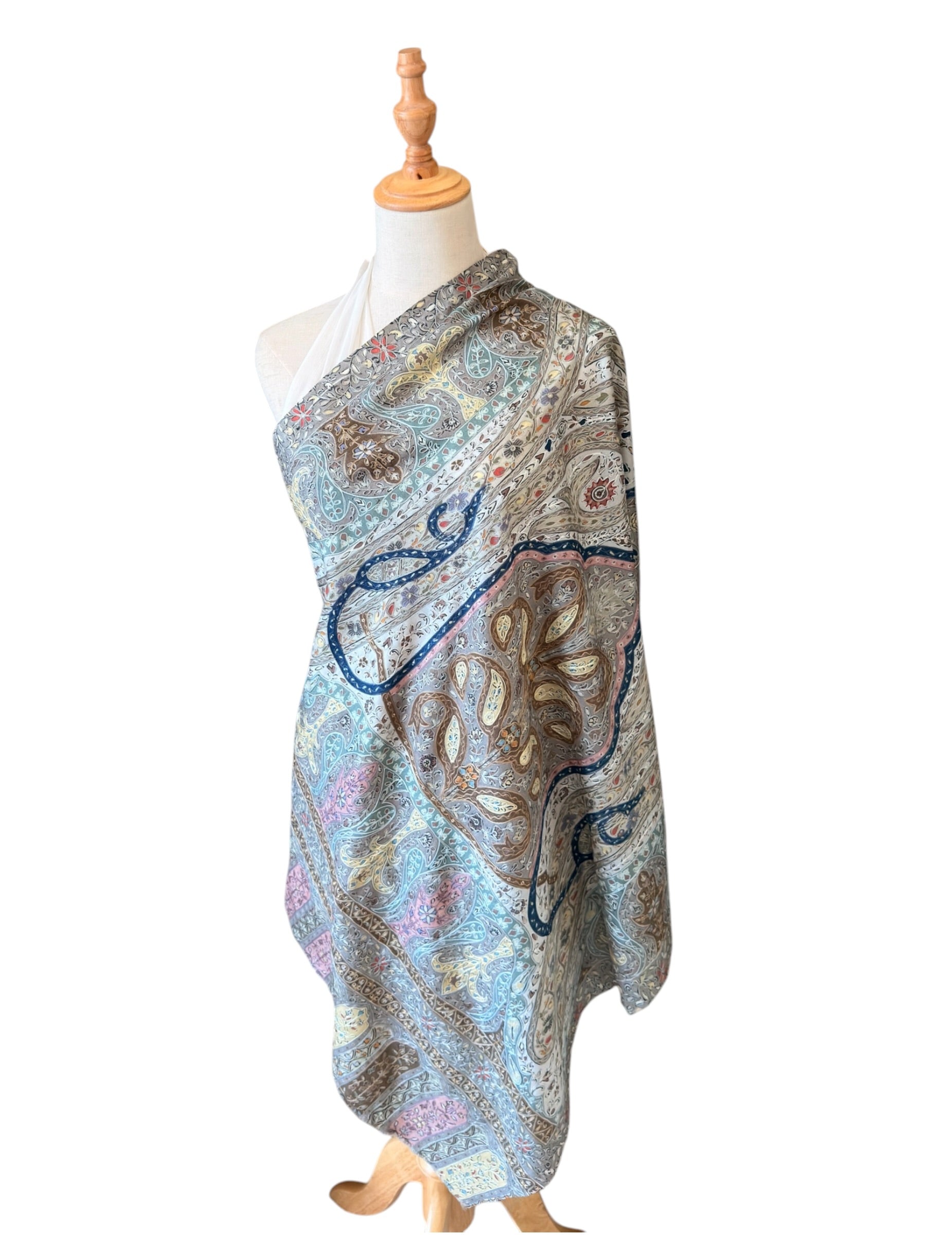 Noori Couture aqua handwoven Merino wool shawl featuring intricate hand-painted Kalamkari motifs and silk embroidery.