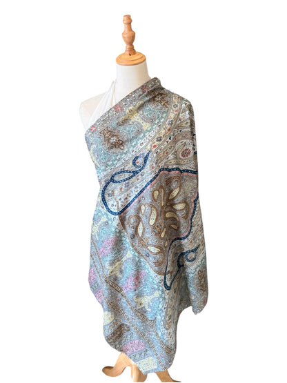 Noori Couture aqua handwoven Merino wool shawl featuring intricate hand-painted Kalamkari motifs and silk embroidery.