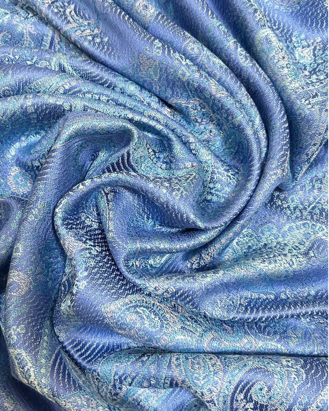 Noori Couture aquamarine pure silk shawl with intricate paisley pattern. Lightweight and luxurious.