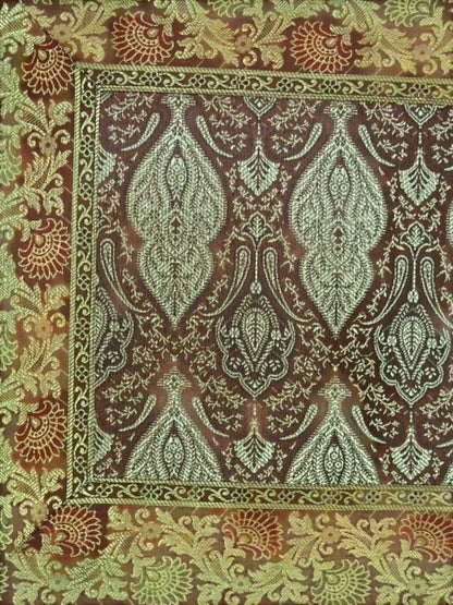 Noori Couture Banarasi brocade cushion cover with intricate zari detailing in brown, green, and red.