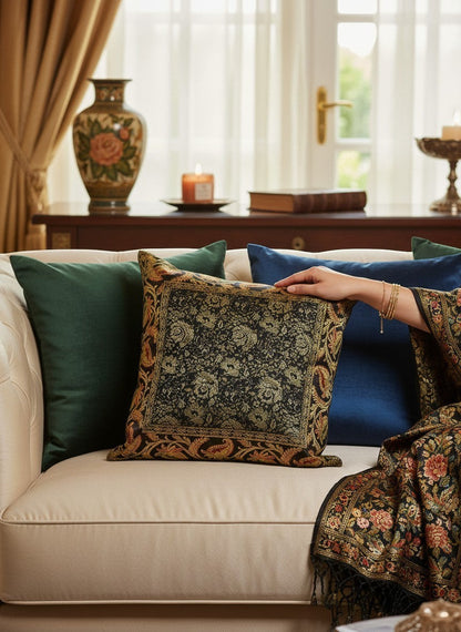 Noori Couture Banarasi brocade cushion cover with intricate zari detailing and floral motifs in black and gold.