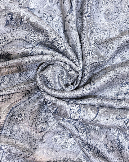Noori Couture handwoven pure silk shawl in black diamond with intricate paisley pattern in silver and navy blue.