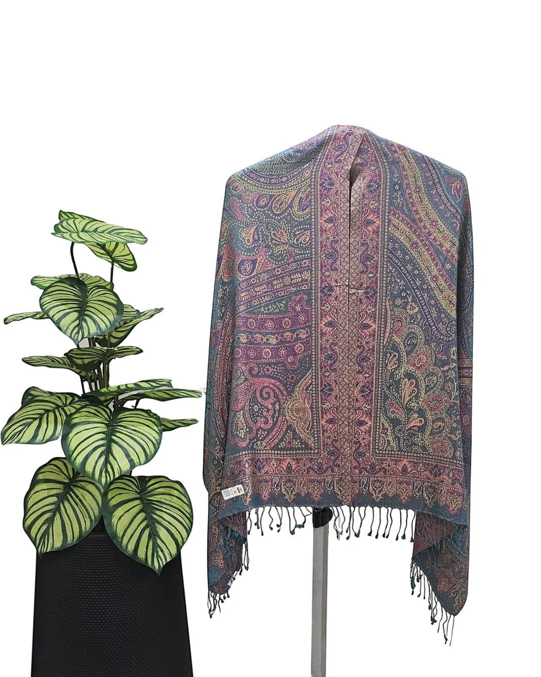 Noori Couture handwoven pure silk shawl in black and green with paisley pattern and fringe detail.