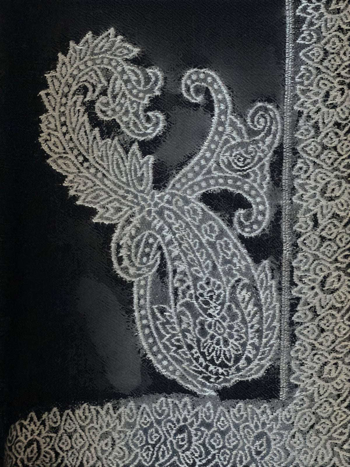 Noori Couture black handwoven Kashmir fine wool shawl featuring intricate silver Hashidar paisley embroidery.
