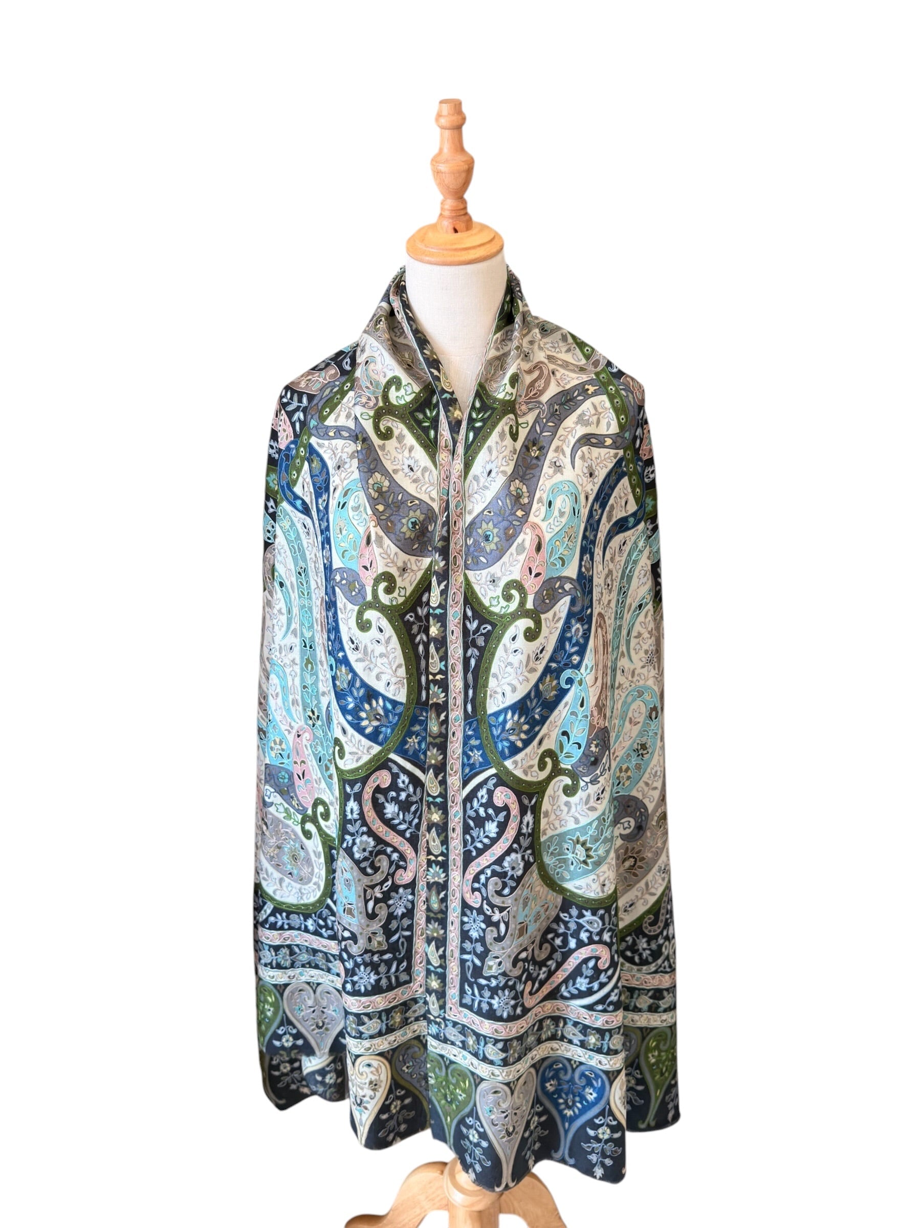 Noori Couture black handwoven merino wool and silk shawl featuring intricate hand-painted Kalamkari paisley patterns.