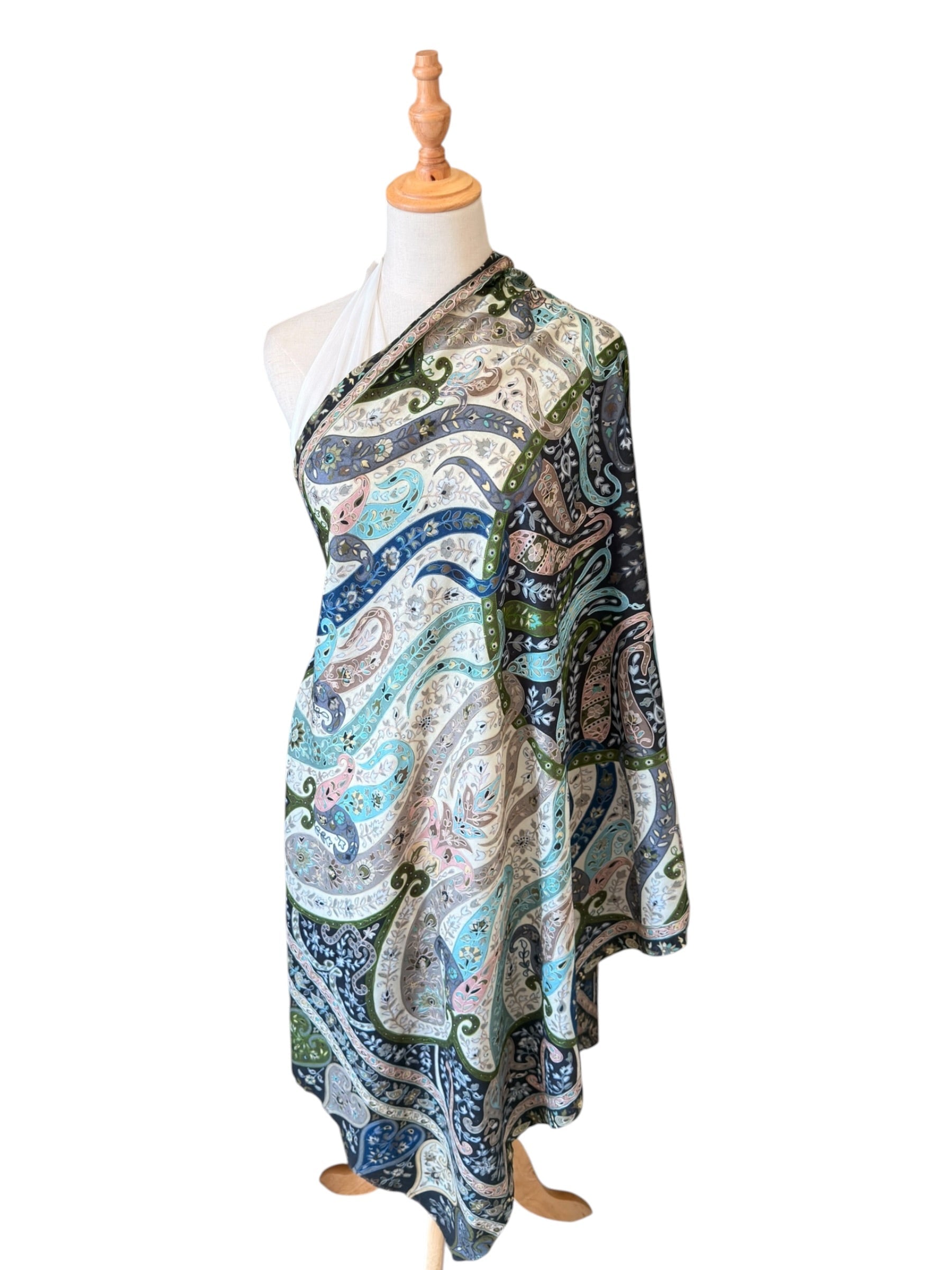 Noori Couture black handwoven Merino wool shawl featuring intricate hand-painted Kalamkari patterns and silk embroidery.