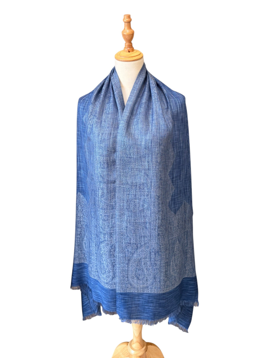Noori Couture blue bamboo silk shawl featuring intricate embroidery and a fluid drape on a mannequin