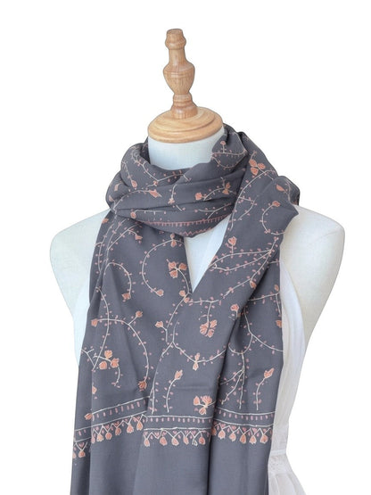 Noori Couture royal blue handwoven shawl with intricate orange floral embroidery and jali detailing.