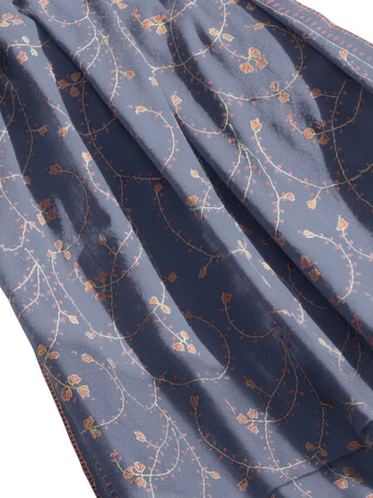 Noori Couture blue handwoven shawl with intricate Sozni Jali embroidery in orange and yellow floral vine pattern.