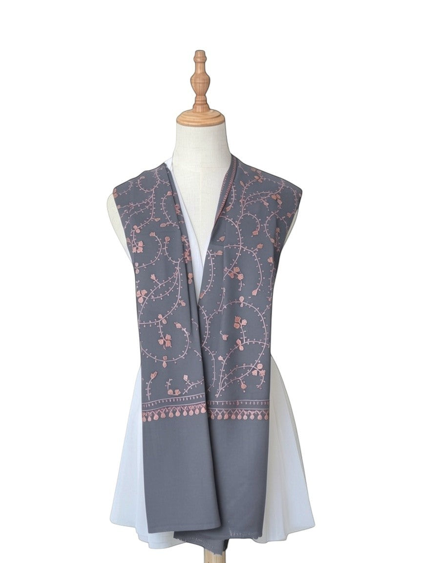 Noori Couture blue handwoven shawl with intricate Sozni Jali embroidery in copper tones.