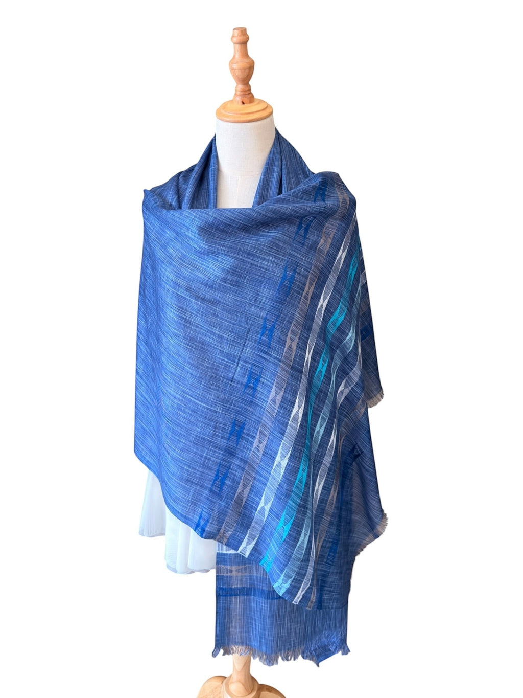 Noori Couture handwoven blue modal and bamboo silk shawl with elegant striped patterns and a soft, graceful drape.