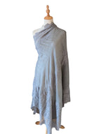 Noori Couture bronze Kashmiri wool shawl featuring delicate Valentino lace trim draped elegantly on a mannequin