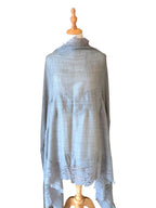 Noori Couture bronze Kashmiri wool shawl featuring delicate Valentino lace trim draped on a mannequin