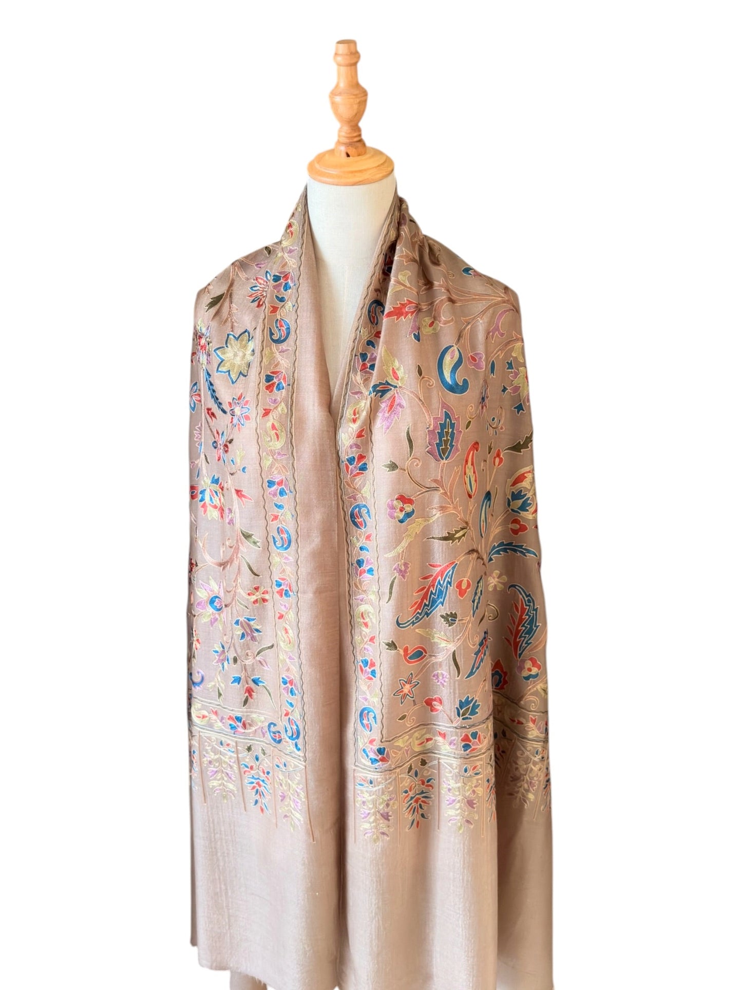 Noori Couture cream handwoven Nalki Jamawar wool shawl featuring intricate multi-colored floral silk embroidery.