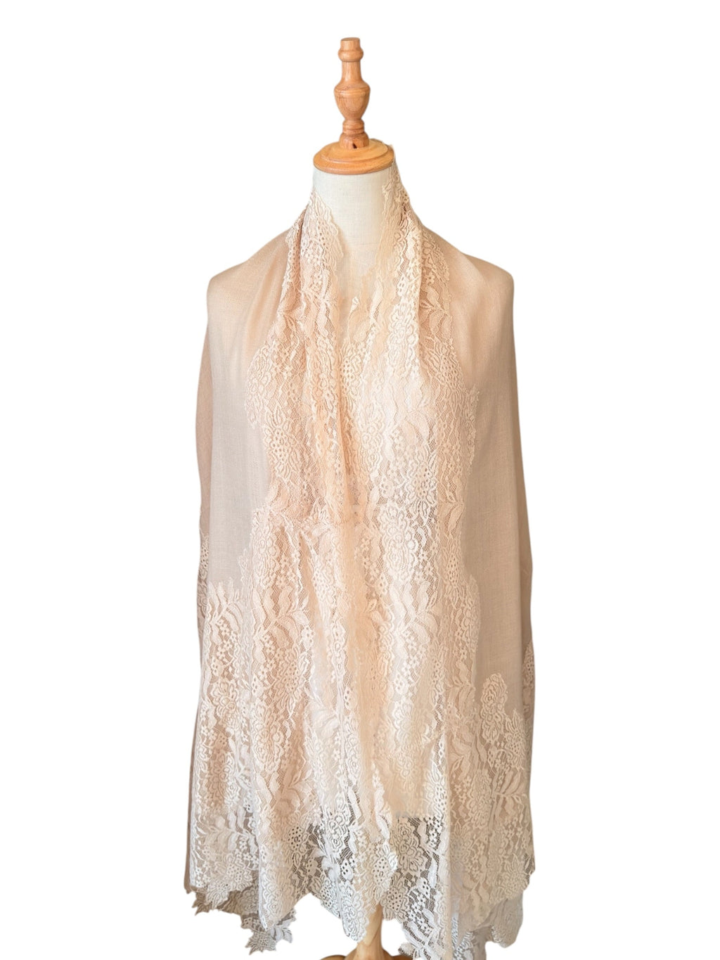 Noori Couture cream Kashmiri wool shawl featuring delicate Valentino lace trim draped on a mannequin