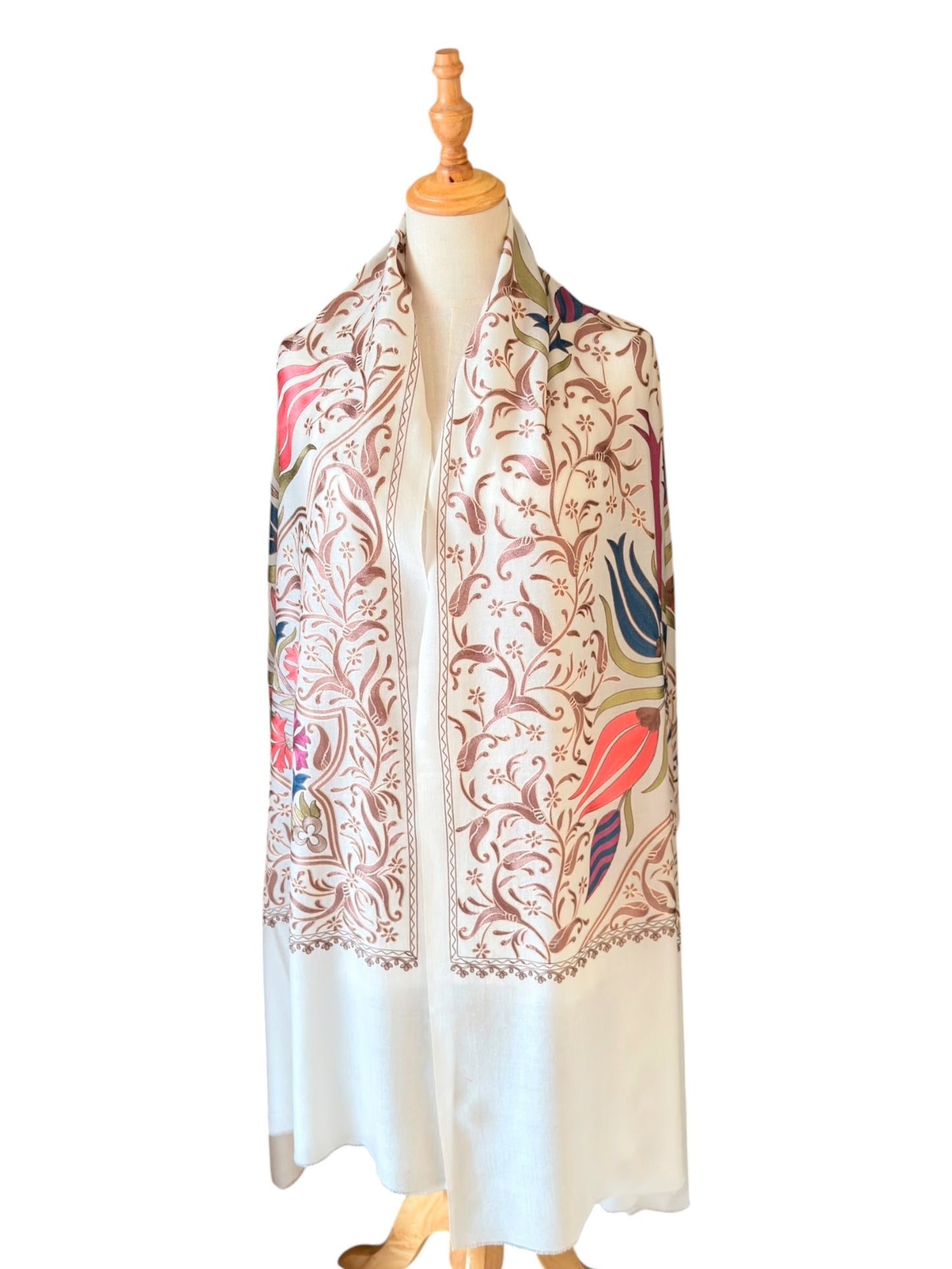 Noori Couture cream handwoven Nalki Jamawar shawl featuring intricate floral silk embroidery on fine wool fabric.