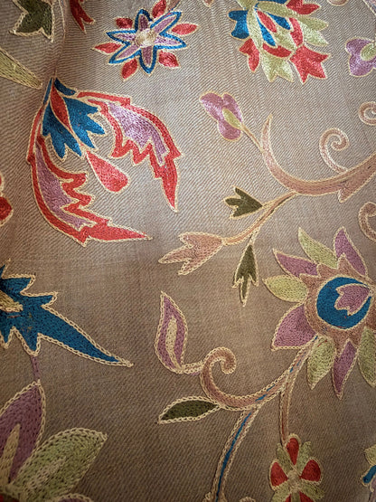 Noori Couture cream wool shawl featuring intricate multi-colored silk floral and paisley hand embroidery
