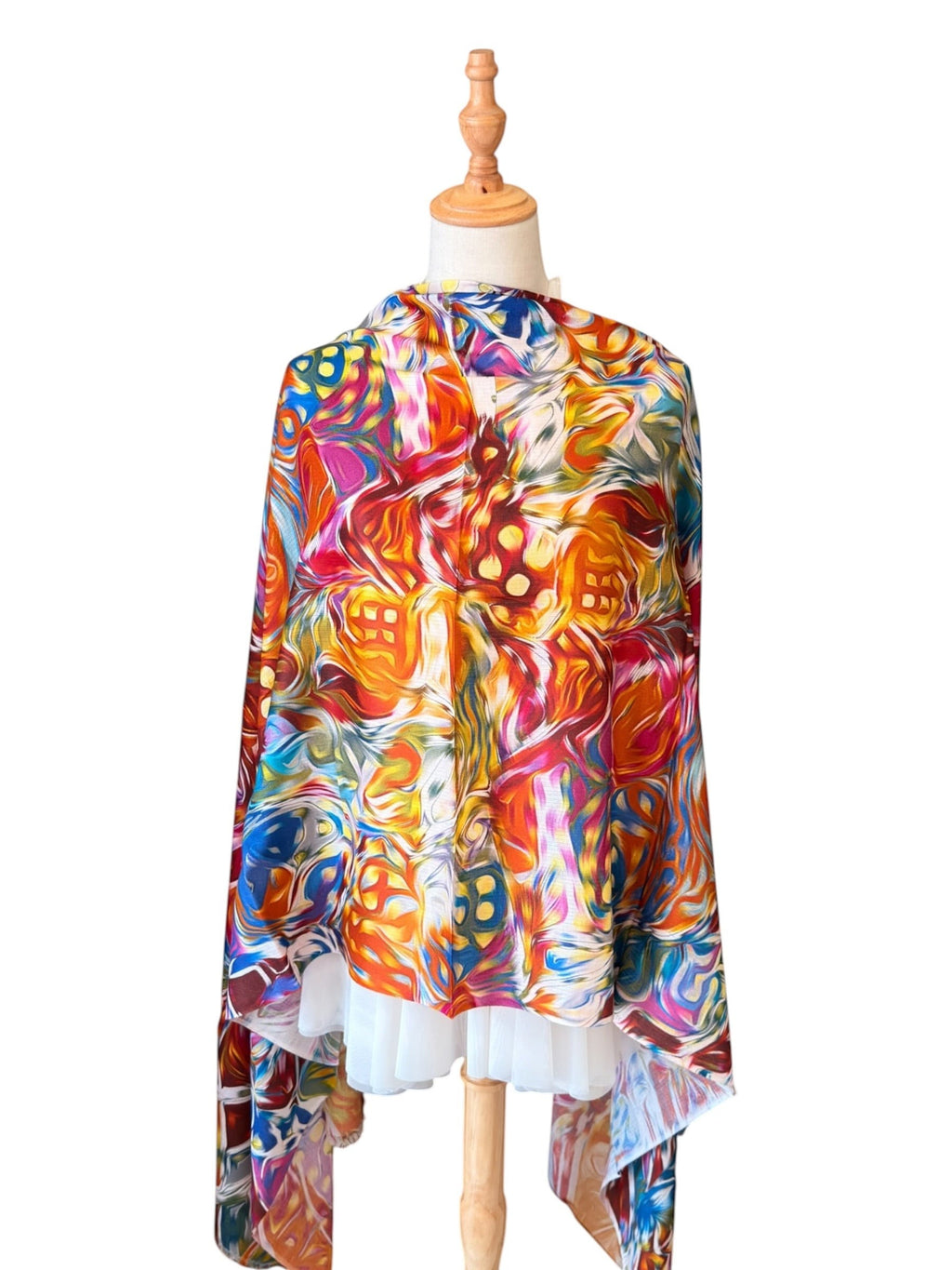 Noori Couture multicoloured digital Kani print shawl in a luxurious modal, bamboo, and silk blend on a mannequin.