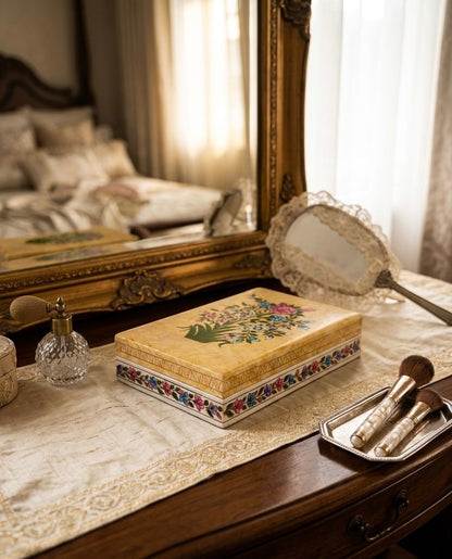 Noori Couture decorative floral papier-mâché keepsake box with hand-painted bouquet on lid and floral border.