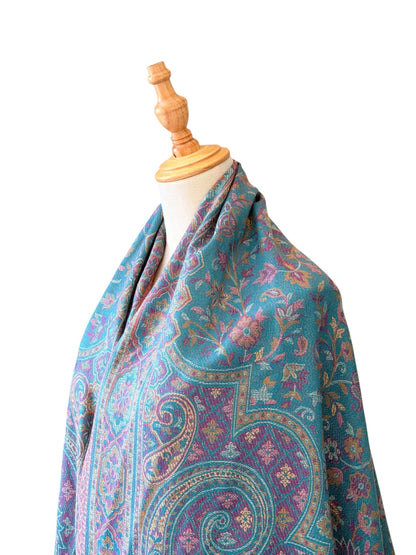 Noori Couture seaweed green pashmina shawl with intricate purple and teal paisley patterns and delicate fringe