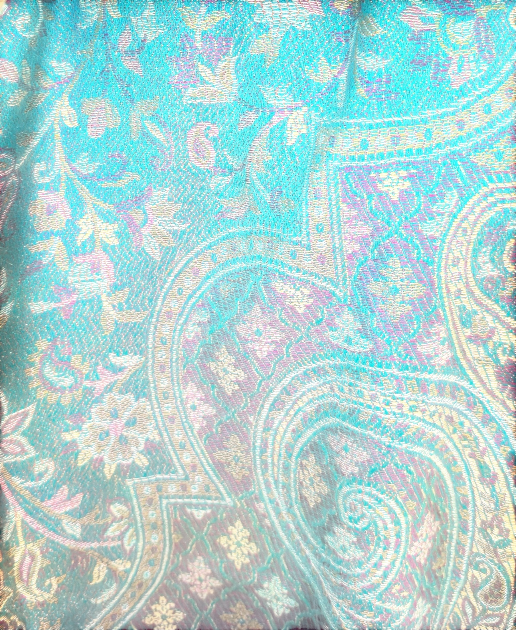 Noori Couture seaweed green pashmina shawl with intricate woven paisley patterns in teal, purple, and earthy tones.