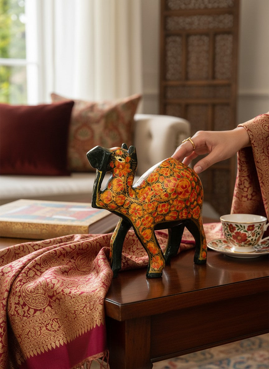 Noori Couture hand-painted papier-mâché camel figurine with intricate gold floral detailing, set of 3.