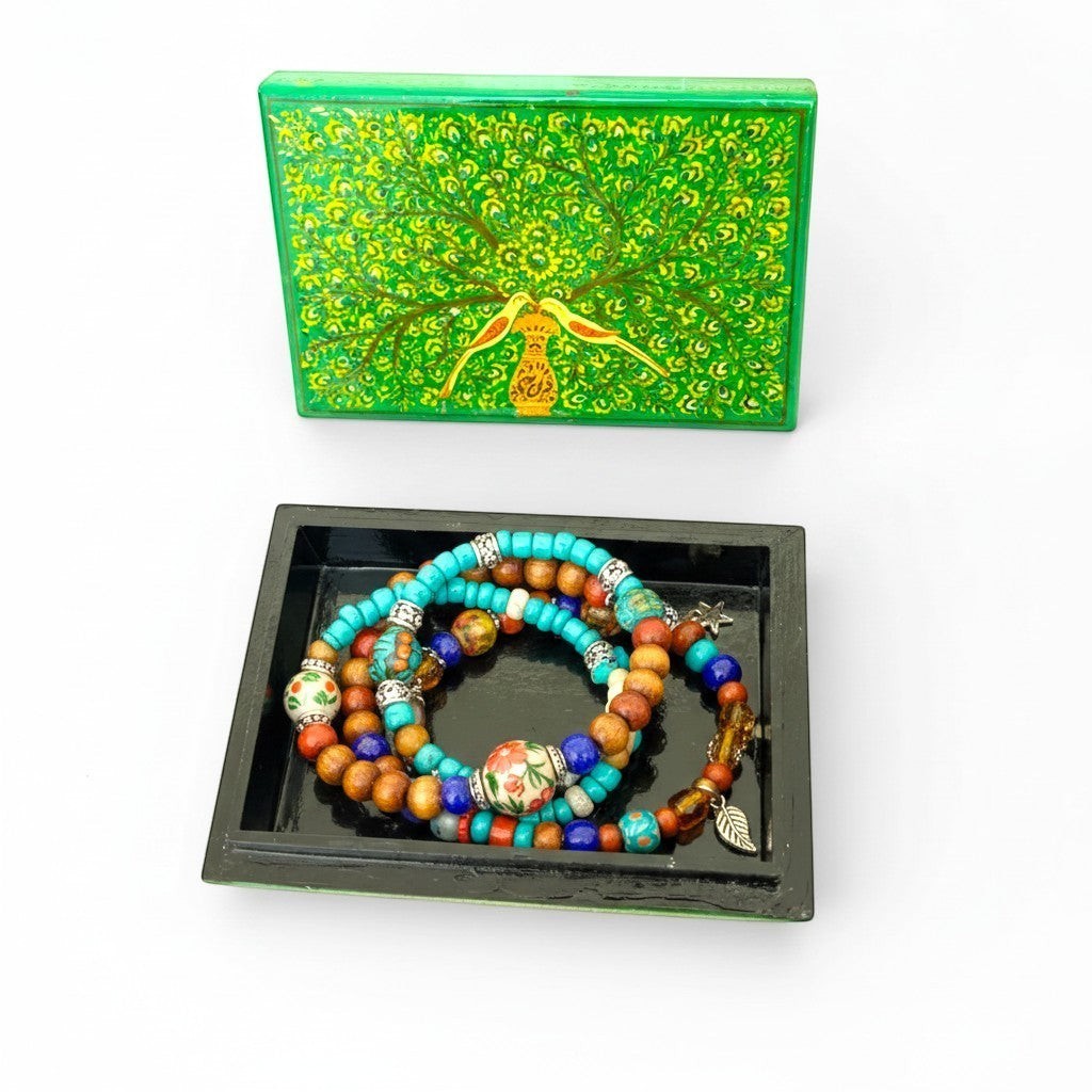 Noori Couture hand-painted green papier-mâché box with yellow and gold tree and birds design. Black interior.