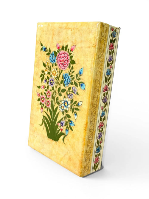 Noori Couture hand-painted papier-mâché jewellery box with floral and bird motifs on a yellow background.