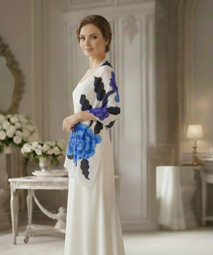 Noori Couture limited edition hand-painted shawl with blue and purple floral design on white fabric.