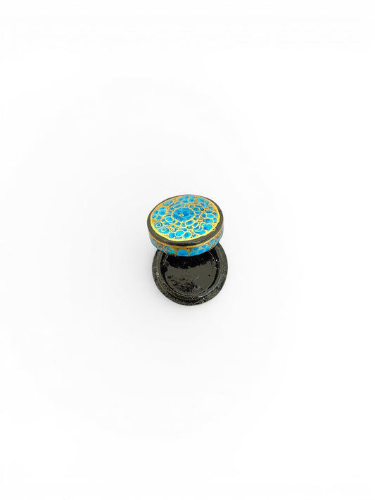 Noori Couture handpainted papier-mâché keepsake box with intricate blue floral design and gold trim on a black base.
