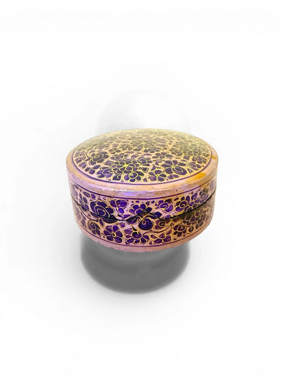 Noori Couture handpainted papier-mâché round coaster set with intricate floral patterns in purple and gold.