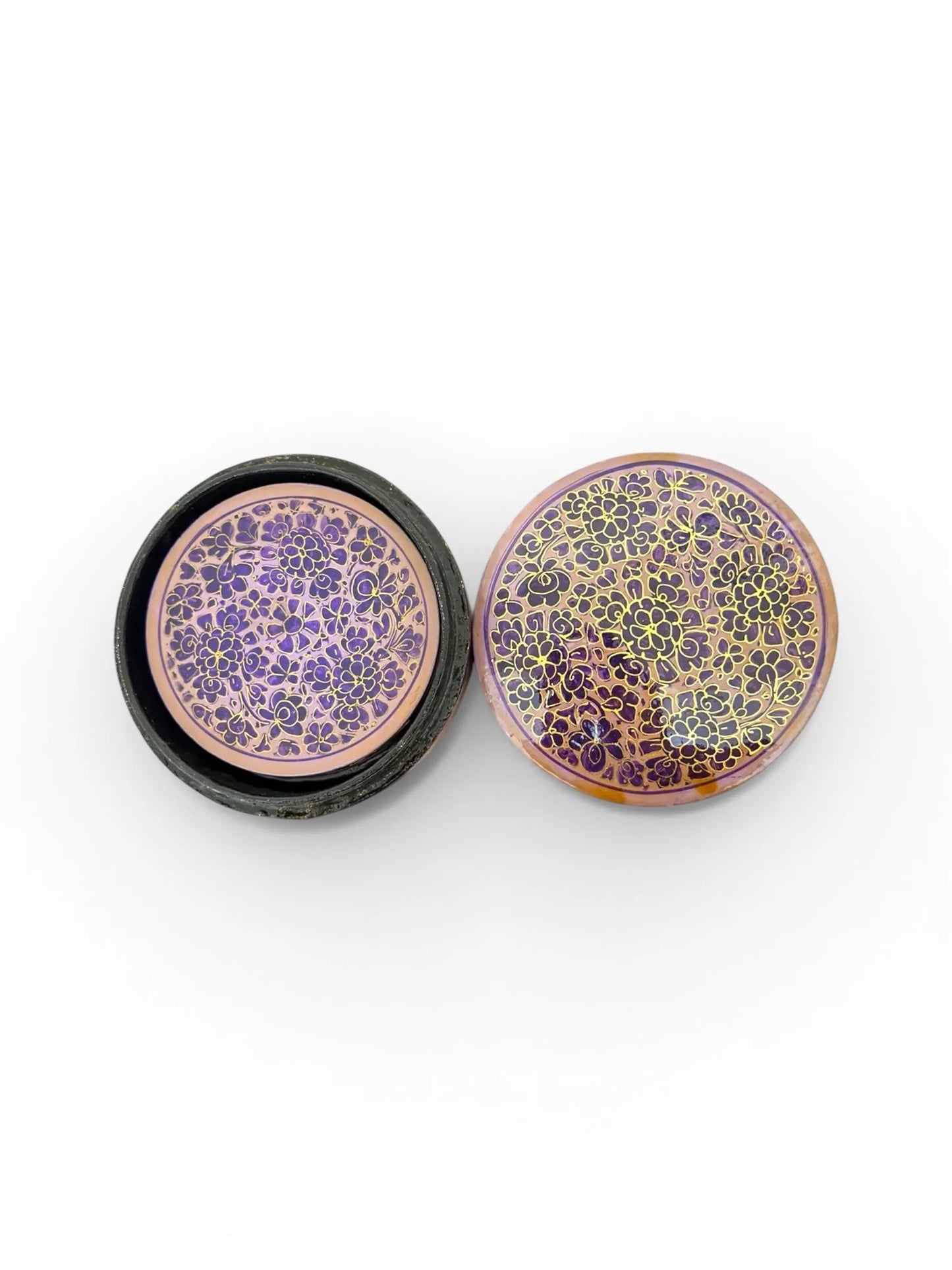 Noori Couture handpainted papier-mâché round coasters with intricate floral patterns in purple and gold.