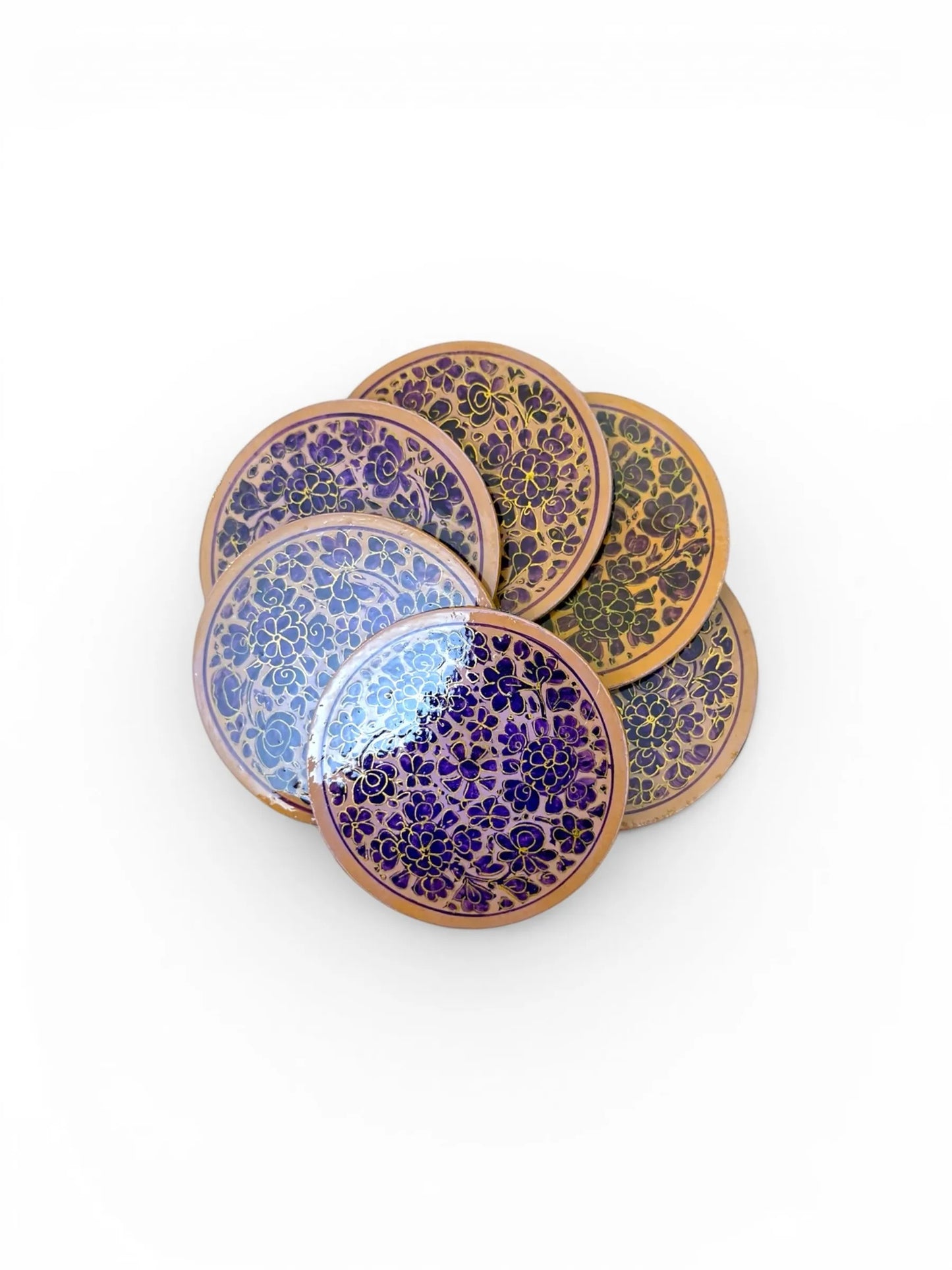 Noori Couture handpainted papier-mâché coasters with floral designs in purple and gold. Round set.