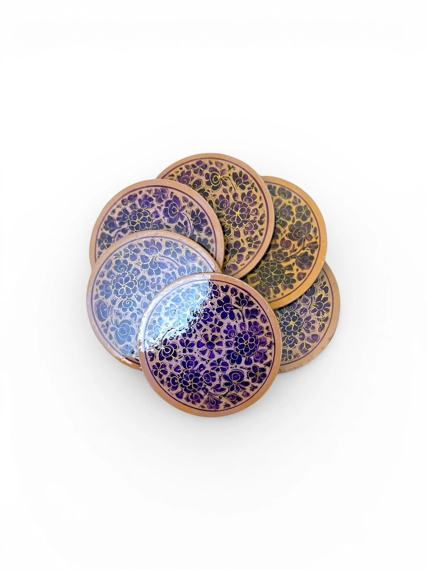 Noori Couture handpainted papier-mâché coasters with floral designs in purple and gold. Round set.