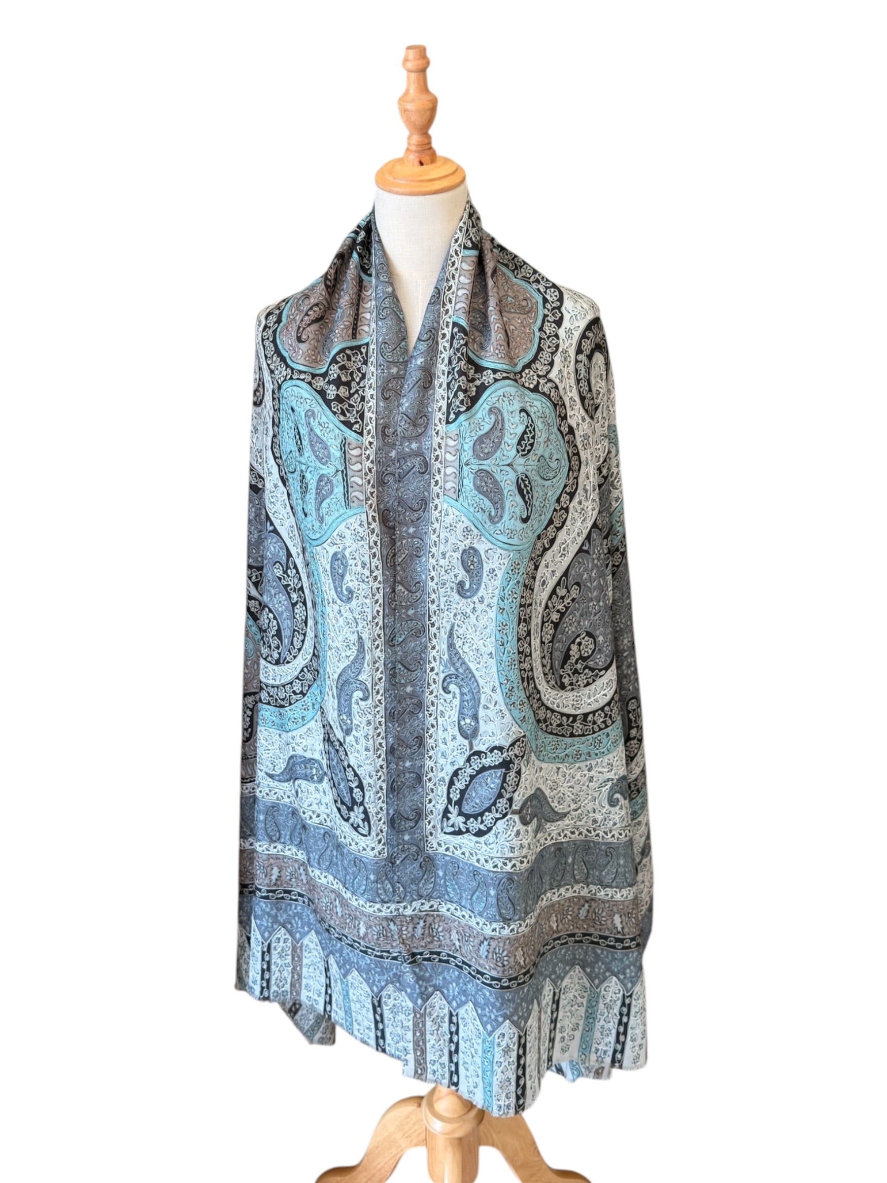 Noori Couture silver blue handwoven merino wool shawl with intricate hand-painted Kalamkari motifs and silk embroidery.