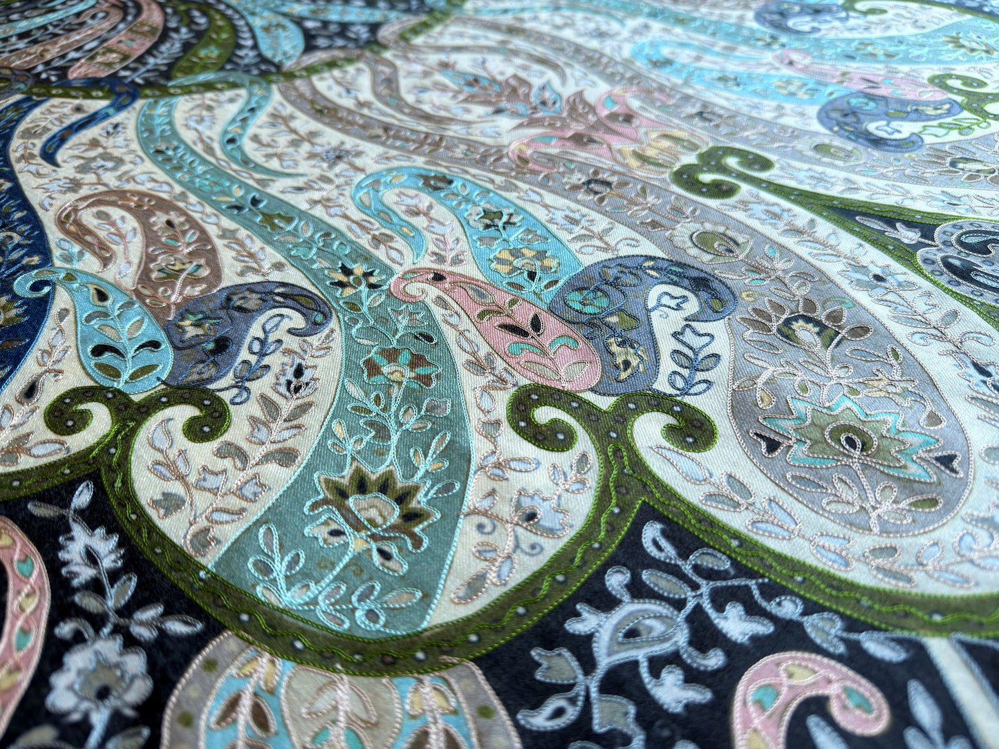 Noori Couture black Merino wool shawl with intricate hand-painted Kalamkari paisley patterns and silk embroidery.