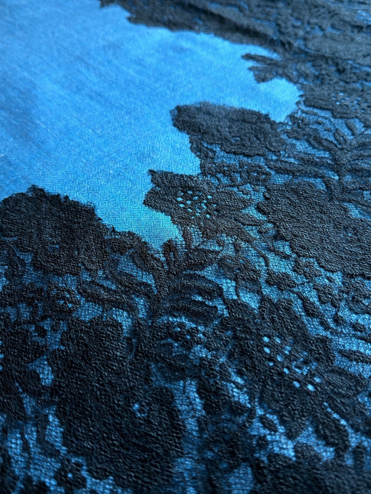 Noori Couture blue black Kashmiri wool shawl featuring intricate black Valentino lace trim and soft fabric texture