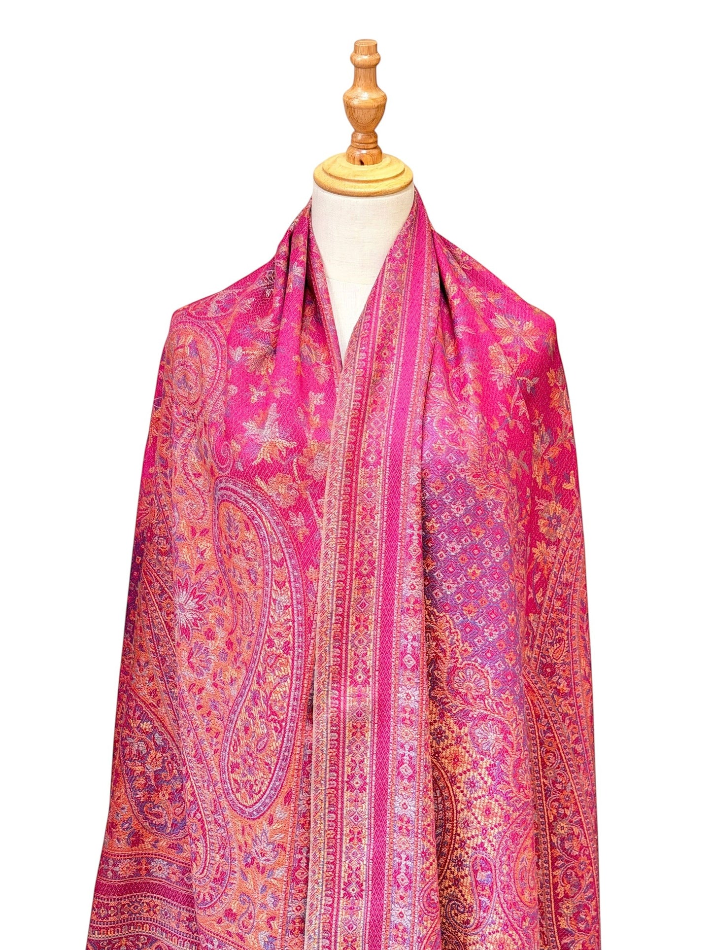 Noori Couture magenta pashmina shawl featuring an intricate traditional paisley pattern and delicate fringe edges.