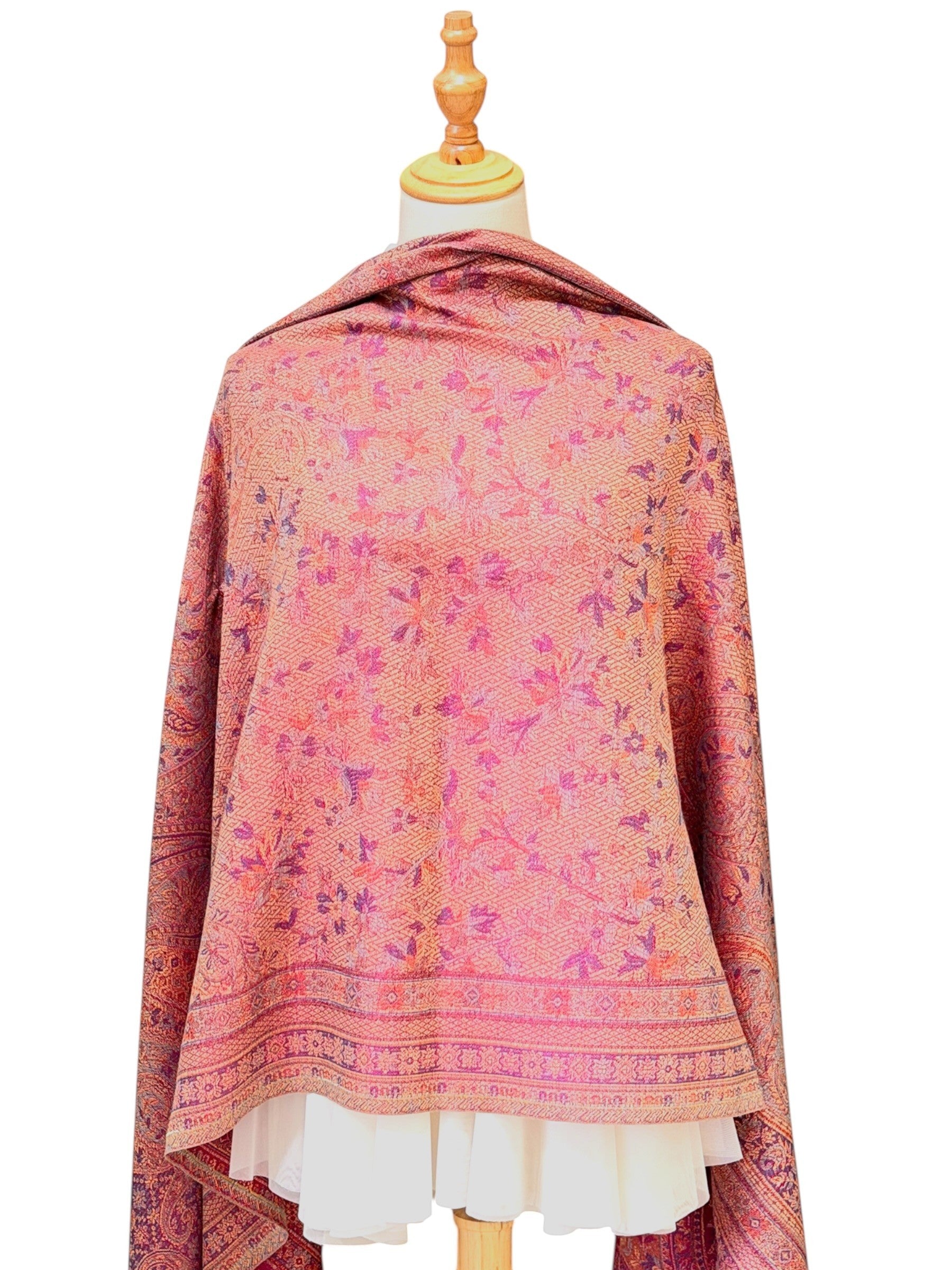 Noori Couture magenta pashmina shawl featuring an intricate traditional paisley pattern and delicate fringe edges