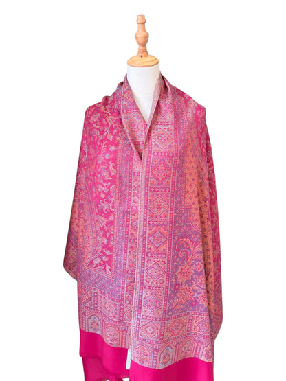 Noori Couture magenta pink shawl wrap with intricate traditional woven patterns and delicate fringe detailing