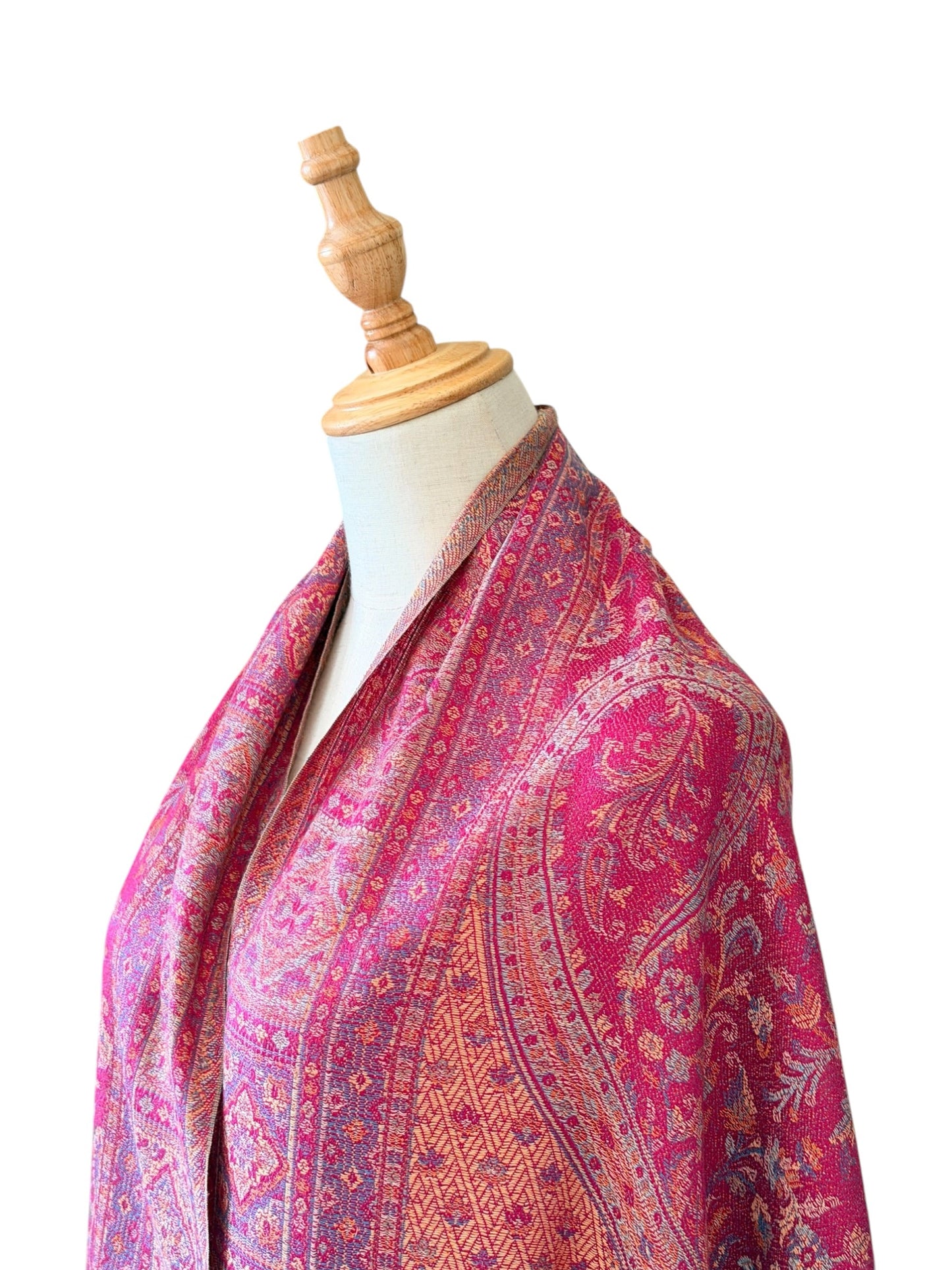 Noori Couture magenta pink cotton and wool shawl with intricate traditional woven patterns and fringe detailing.