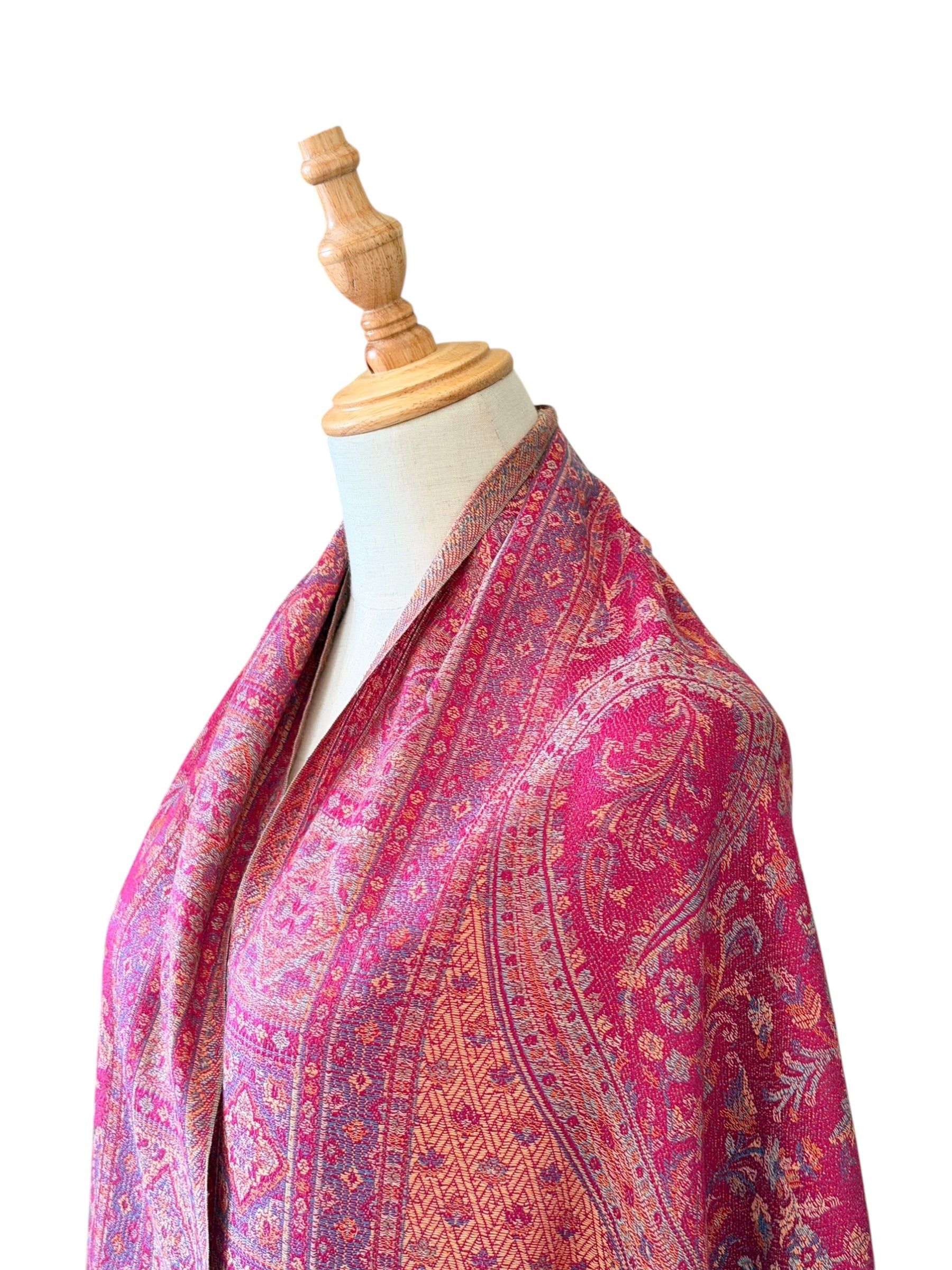 Noori Couture magenta pink cotton and wool shawl with intricate traditional woven patterns and fringe detailing.
