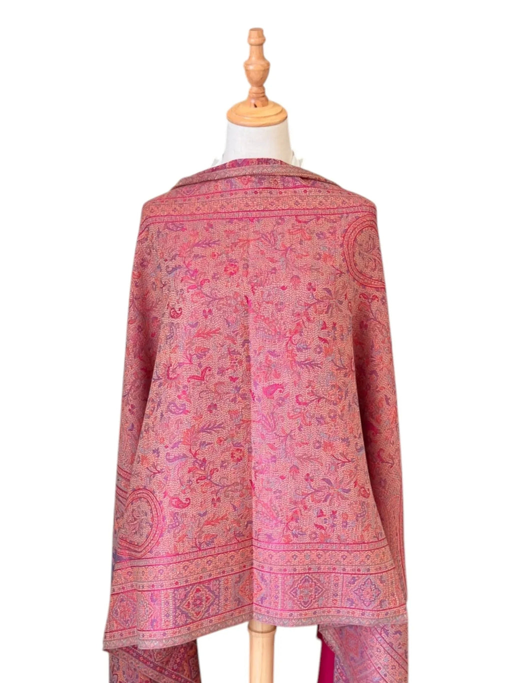 Noori Couture magenta pink shawl wrap with intricate traditional woven patterns and delicate fringe detailing