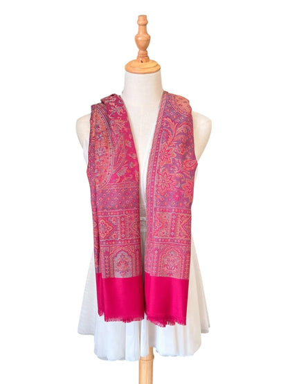 Noori Couture magenta pink cotton and wool shawl with intricate traditional woven patterns and delicate fringe edges.