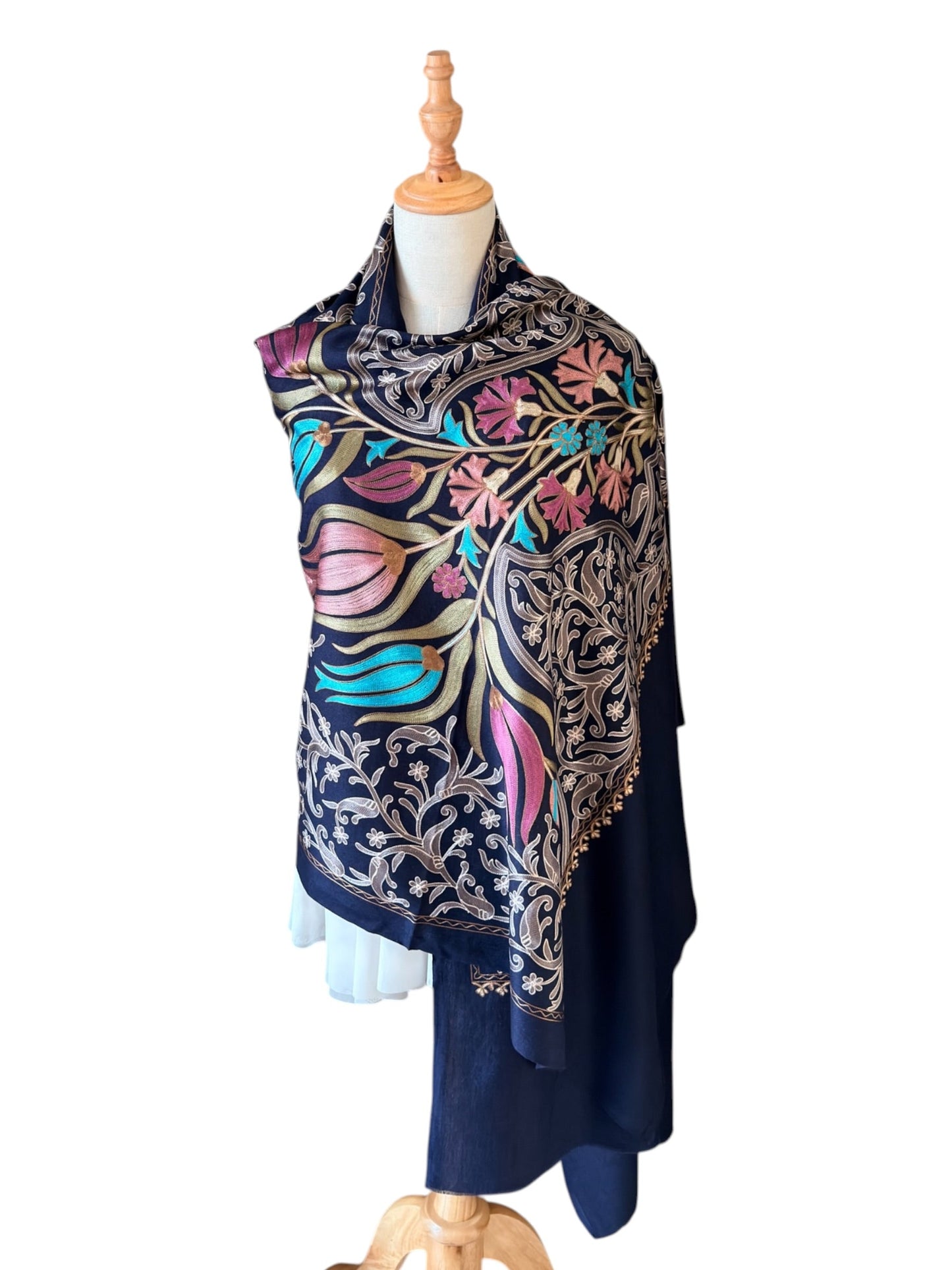 Noori Couture handwoven Montana Blue wool shawl featuring intricate multi-colored silk floral and vine embroidery.